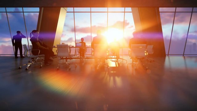 Business team in conference room, rear view sunset