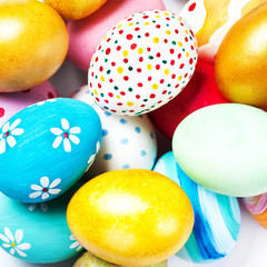  Colorful Easter Eggs on white with copy space..
