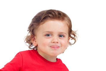 Portrait of playful small kid with curly blond hair mockering