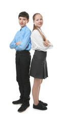 Cute boy and girl in school uniform standing on white background