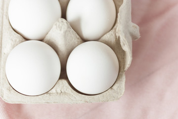 Easter eggs on pale background