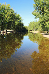 Fototapeta na wymiar River and reflections