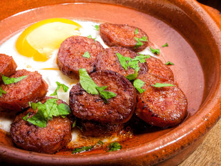 fried chorizo with fried egg