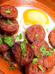 fried chorizo with fried egg