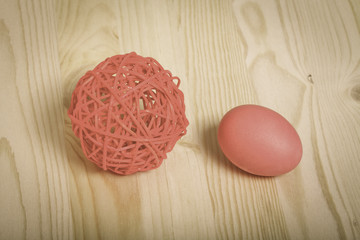 Easter symbols - colored eggs on light background. Toned