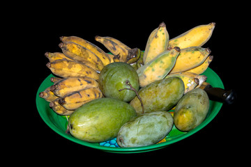Mangoes and ripe bananas