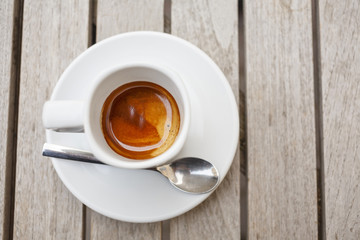 Coffee cup on the wooden table