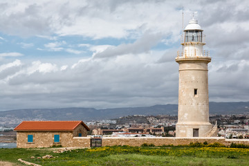 Fototapeta na wymiar Old lighthouse in Paphos, Cyprus.