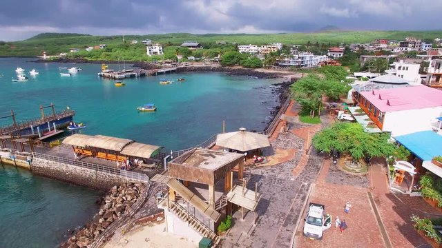 Aerial view of iconic landscape of San Cristobal island, Puerto Baquerizo Moreno capital, Galapagos, Ecuador from above