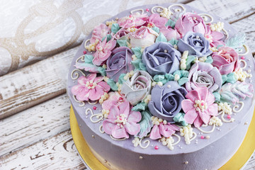 Birthday cake with flowers rose on white background