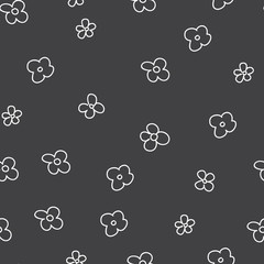 Seamless pattern from flowers on a black background. The sketch drawn with a brush. Scribble