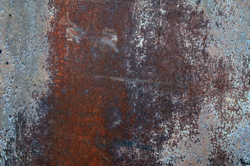 Old rusty steel metal wall with heavy corrosion background texture