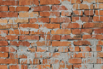Old vintage red brick wall with cement background texture