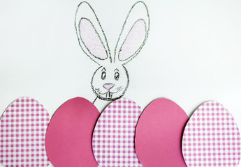 easter card with colorful paper eggs  and painted bunny 