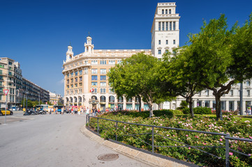 Fototapeta na wymiar Sunny view of Catalonia Square (Plaza Catalunya) in Barcelona, Spain.