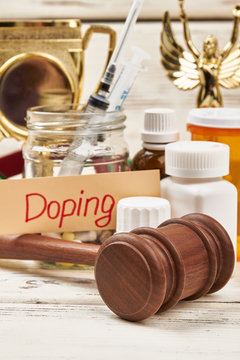 Hammer, award and pills. Criminal responsibility for doping.