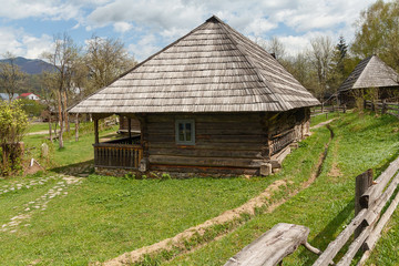 Fototapeta na wymiar Ancient wooden house Ukrainian peasant. Kolochava, Ukraine