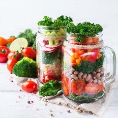 Healthy vegan salad in a mason jar with quinoa