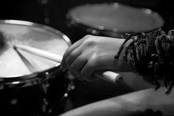 Girl rocker plays on drum set