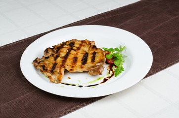 Grilled Pork Fillet With Cherry Tomatoes, Green Leaves, Pesto And Soy Sauce
