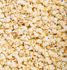 Delicious salty popcorn. Background.