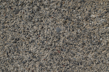 Rough textured stone wall gray