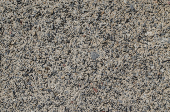 Rough textured stone wall gray