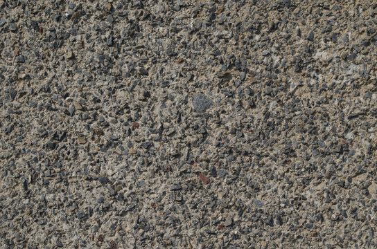Rough textured stone wall gray