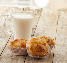 Savory cheese and bacon muffins on the wooden table