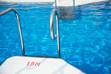 View of top deck of cruise ship with pool.