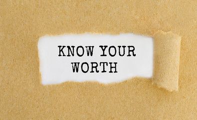 Know Your Worth appearing behind ripped brown paper.