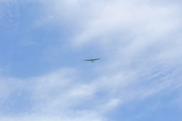 Fototapeta na wymiar Glider on blue sky
