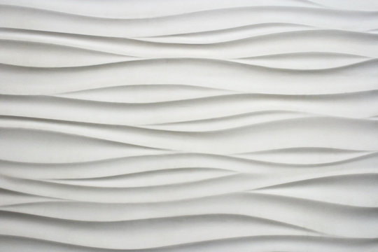 Abstract background: white wavy texture. Decorative wall decoration