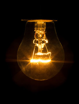 A bulb of incandescence is included isolated on black background.