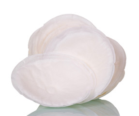Absorbent breast pads close-up isolated on white. © laboko