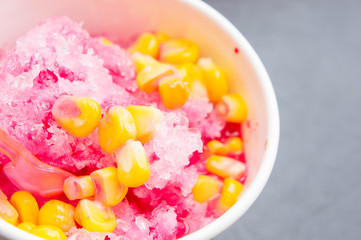 shave ice withe sala flavor and condensed milk and sweet corn , crushed ice refreshing