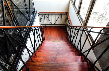 Fototapeta premium Wooden stairs in the coffee shop, interior or modern concept