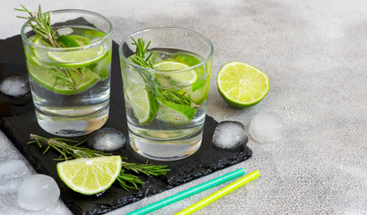 Cocktail with lime and rosemary, copy space