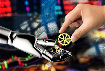 Cyber communication , robotic , Fintech and robo advisor in stock market finance concept. Man finger holding gear on 3d rendering of robot hand with abstract stock chart electric circuit graphic.