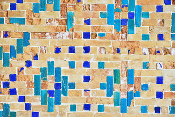 Part of brick wall with majolica tiles, Registan Square Shah-i-Zinda - UNESCO World Heritage, Samarkand, Uzbekistan