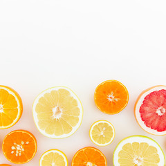 Fruit background. Pattern of citrus on white background. Flat lay, top view.