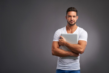 Young man with laptop	