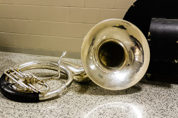 sousaphone resting before the start of marching band rehearsal
