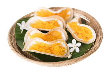 Thai dessert decor with banana leaf and wooden tray isolated with path