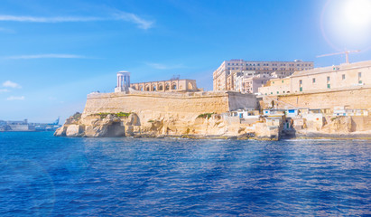 Traditional medieval architecture of Valletta, famous place of Malta, in summer season - obrazy, fototapety, plakaty