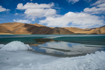 Beautiful landscape of Pangong lake over blue sky in Leh Ladakh, India.