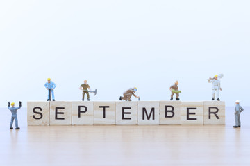 September words with Miniature people worker