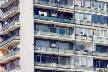 Obraz premium Tall Building With Many Cheap Apartments In It With Balcony Closeup Shot