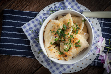 Dumplings with meat, onion and bacon.