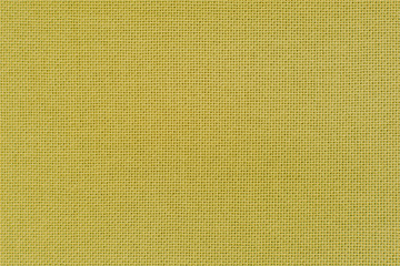 Fototapeta premium Texture of the yellow color linen fabric. Close-up view for the background.